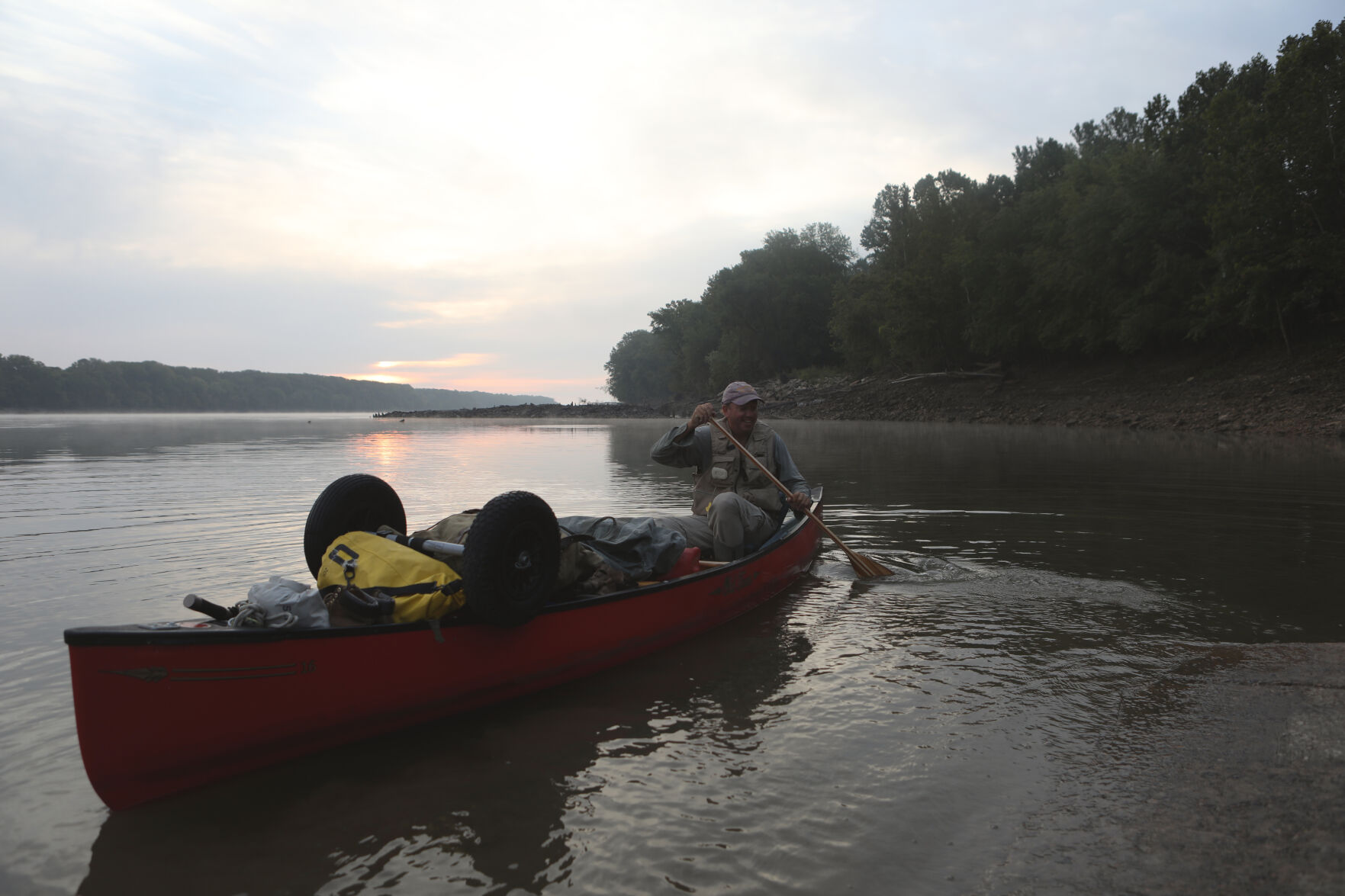 Neal Moore paddles away